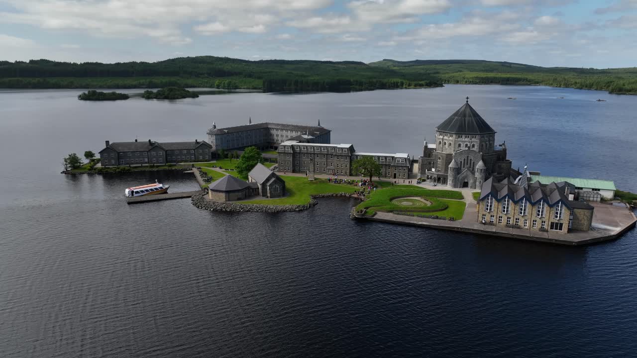 Lough Derg, County Donegal, Ireland, June 2023. Drone front static establishing view of St. Patrick's Purgatory on Station Island.