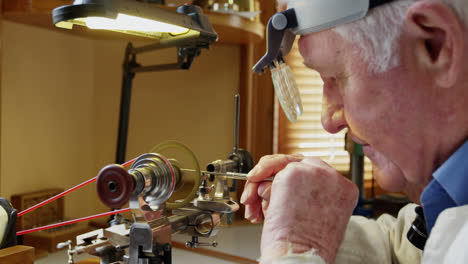 horologist repairing a watch