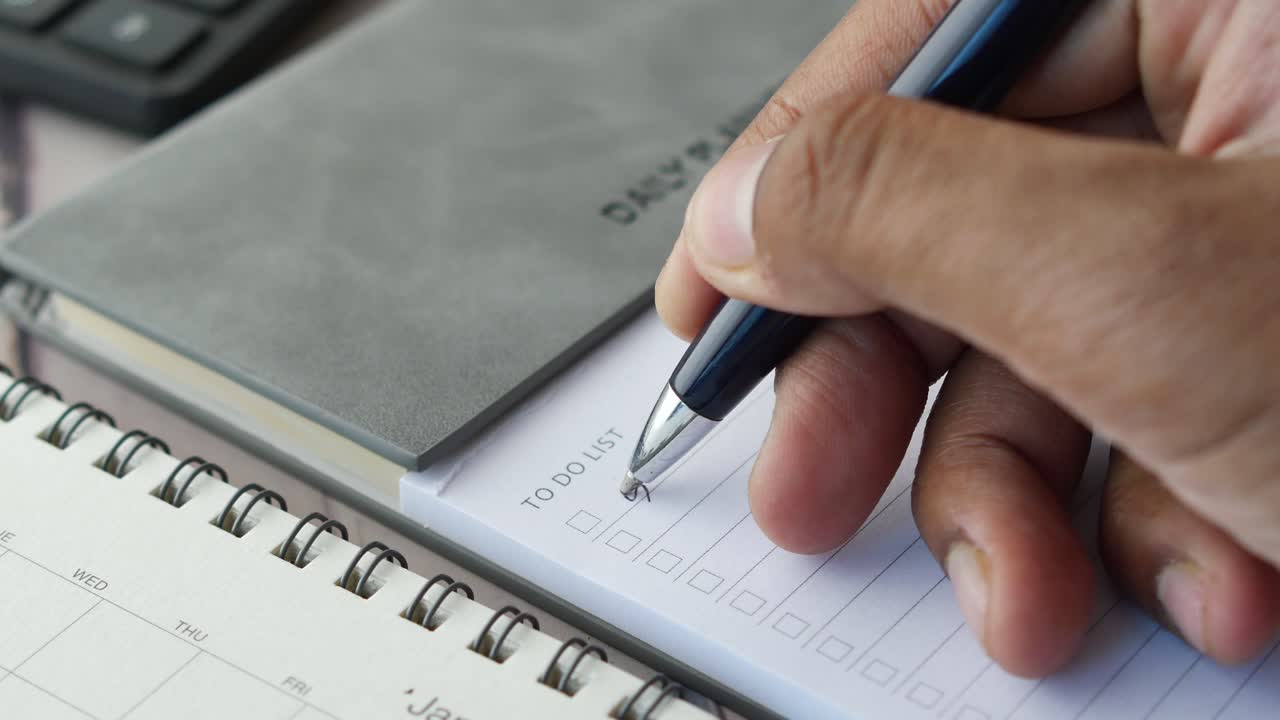 Writing goals and action plan on a diary ,