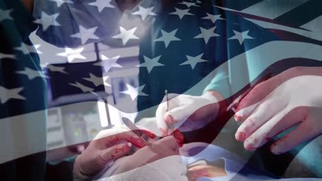 Animation-of-flag-of-usa-waving-over-surgeons-in-operating-theatre