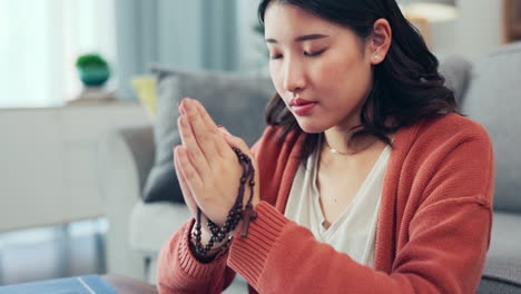 Christian-woman,-rosary-and-praying-in-home