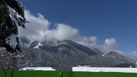 Winter-beauty-snow-in-Pahalgam,-Kashmir:-A-Snowy-Adventure-in-the-Himalayan-Region-Anantnag---snow-on-roads,-Snowboarding,-and-Majestic-View