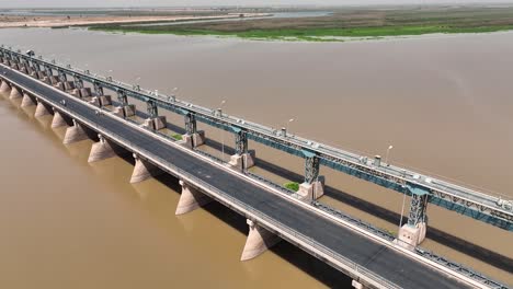 aerial drone shot of bride above indus river in pakistan