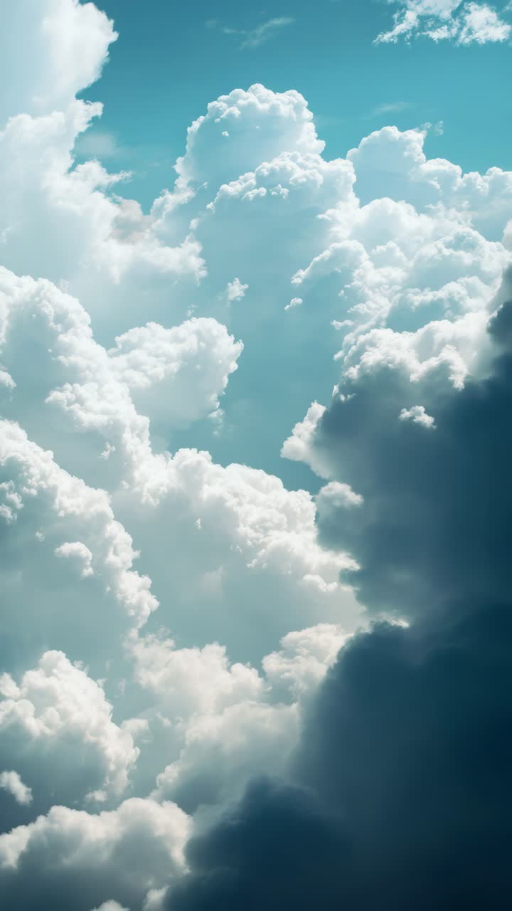 A stunning upward camera angle captures fluffy clouds against a bright blue sky, perfect