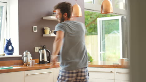 man dancing in kitchen