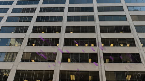 animation of purple light flares moving over modern city building