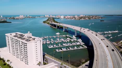 bridge leading into clearwater florida beach from downtown in 4k aerial