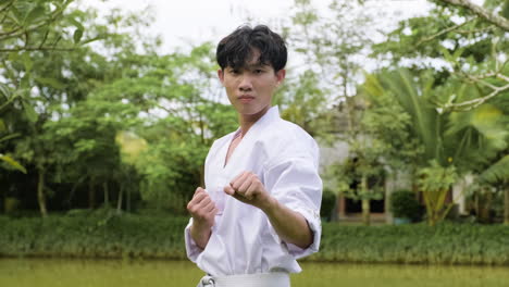 young man practising taekwondo