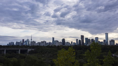 Timelapse-of-cloudy-sunset-into-clear-night-sky-over-the-Toronto-skyline-from-Chester-Hill-Lookout