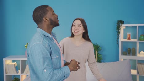 asian wife trying to comfort her black partner about her problem.