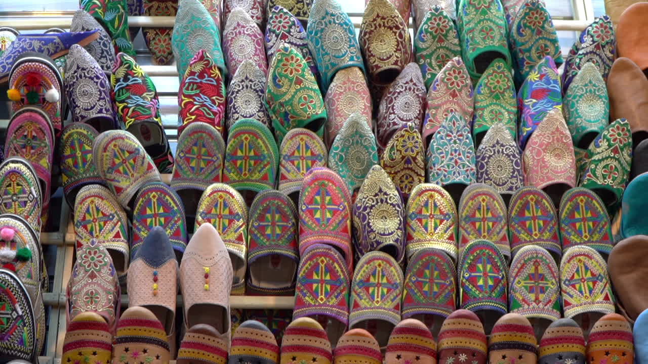 Discover the rich heritage of Morocco with authentic belgha leather shoes in Marrakech's vibrant old medina market