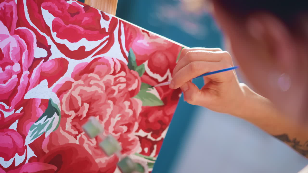 Caucasian Artist Adding Delicate Highlights To Painted Petals On Canvas, Macro Perspective With Vivid Pigments, Precise Wrist Control And Concentrated Technique Under Bright Studio Light