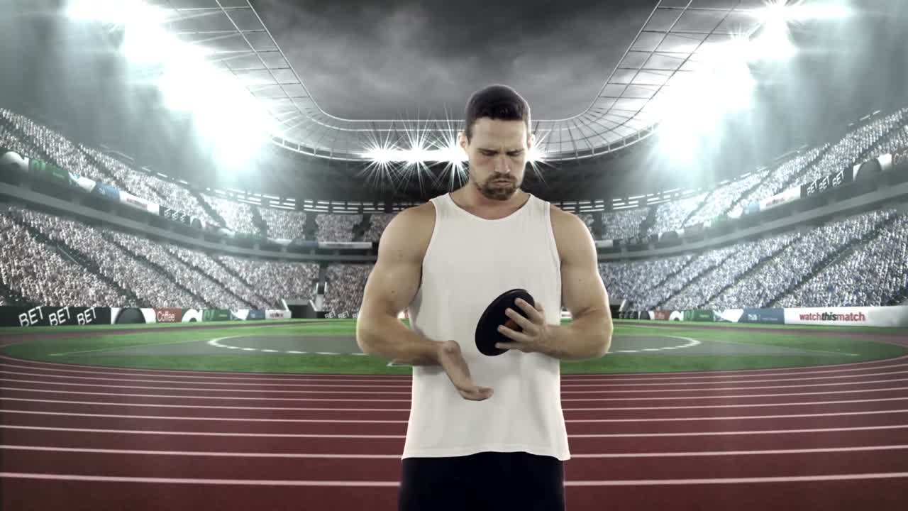 디스크 던지기를 연습하는 남성 운동 선수