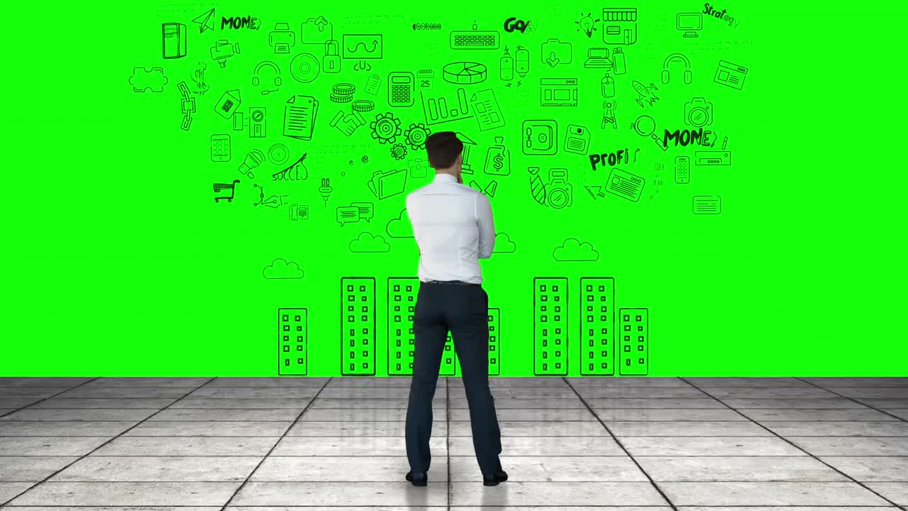 초록색 인터페이스를 보는 사업가