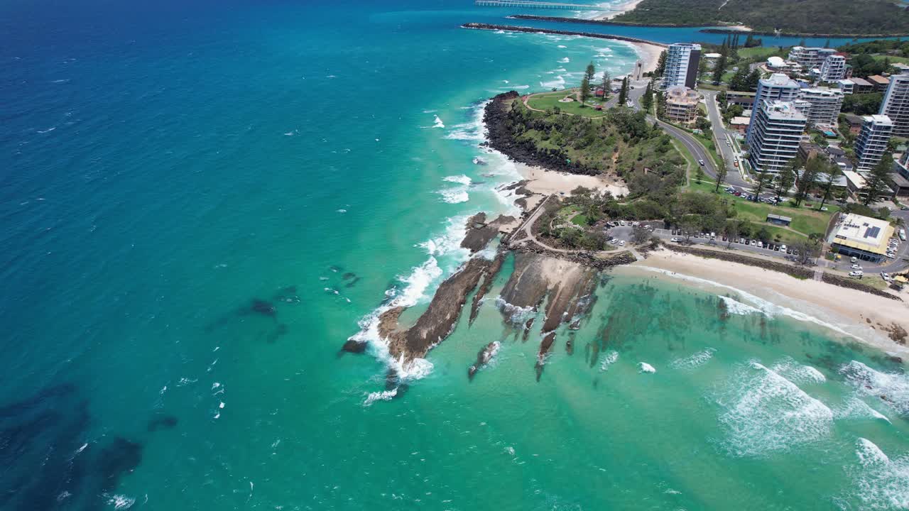Aerial View of Stunning Coastline with Turquoise Water and Waves