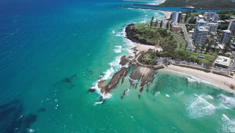 aerial view of stunning coastline with turquoise water and waves
