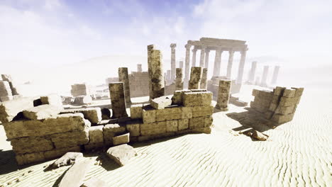 ancient ruins amidst sandy desert landscape under blue sky