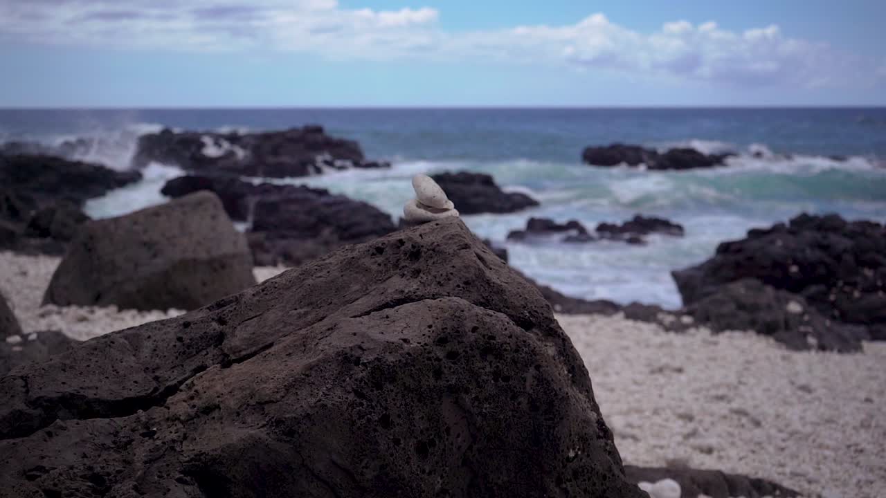 Kaena Point is the Northwestern most tip of the Hawaiian island of Oahu along a hiking trail with beautiful landscape views of the Pacific Ocean