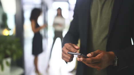 Black-man-on-smartphone,-businessman-working-as