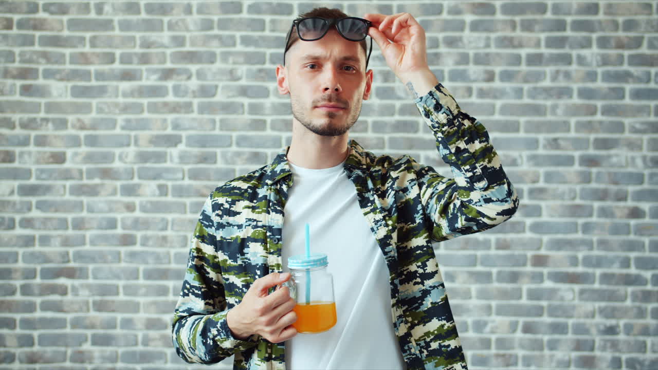 Stylish Man Drinking Orange Juice