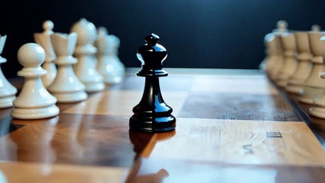 close-up of a black bishop chess piece on a chessboard