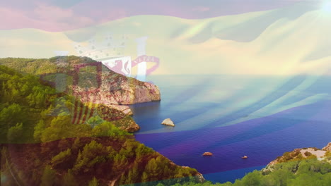 composición digital de la bandera española ondeando contra la vista aérea del mar