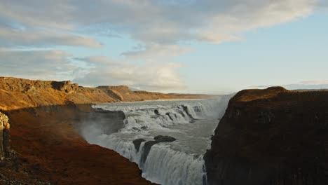 stunning long shot of the gullfoss waterfall on a sunny day