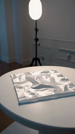 white fabric display in studio