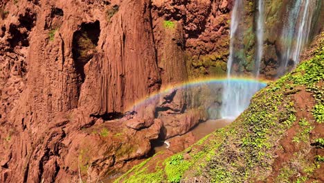 Base-of-Ouzoud-Falls-waterfall-rainbow-at-bottom-in-North-Africa,-Morocco