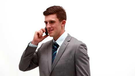 businessman talking on phone white background