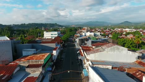 Aerial-drone-view-over-streets-in-Sumbawa-Besar-town,-golden-hour,-in-Indonesia