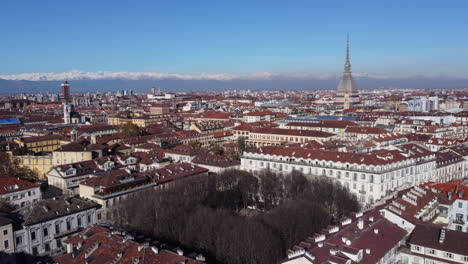 aerial shot over picturesque turin (torino) city centre on sunny winter day