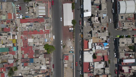 Aerial-overhead-view-vehicles-driving-on-roads,-crossroads