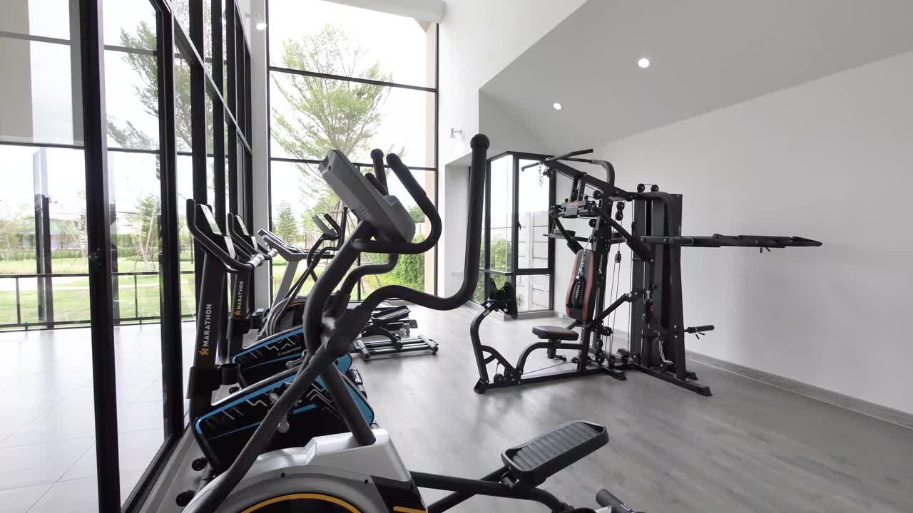 Compact and Stylish Gym With Garden View