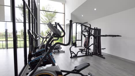 compact and stylish gym with garden view