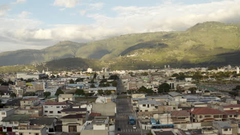 aerial view of a cityscape with mountains