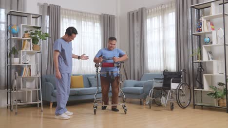 full body of asian male nurse making beckon hand gesture to a patient who use walker walking by himself and encouraging him during a physical therapy at home