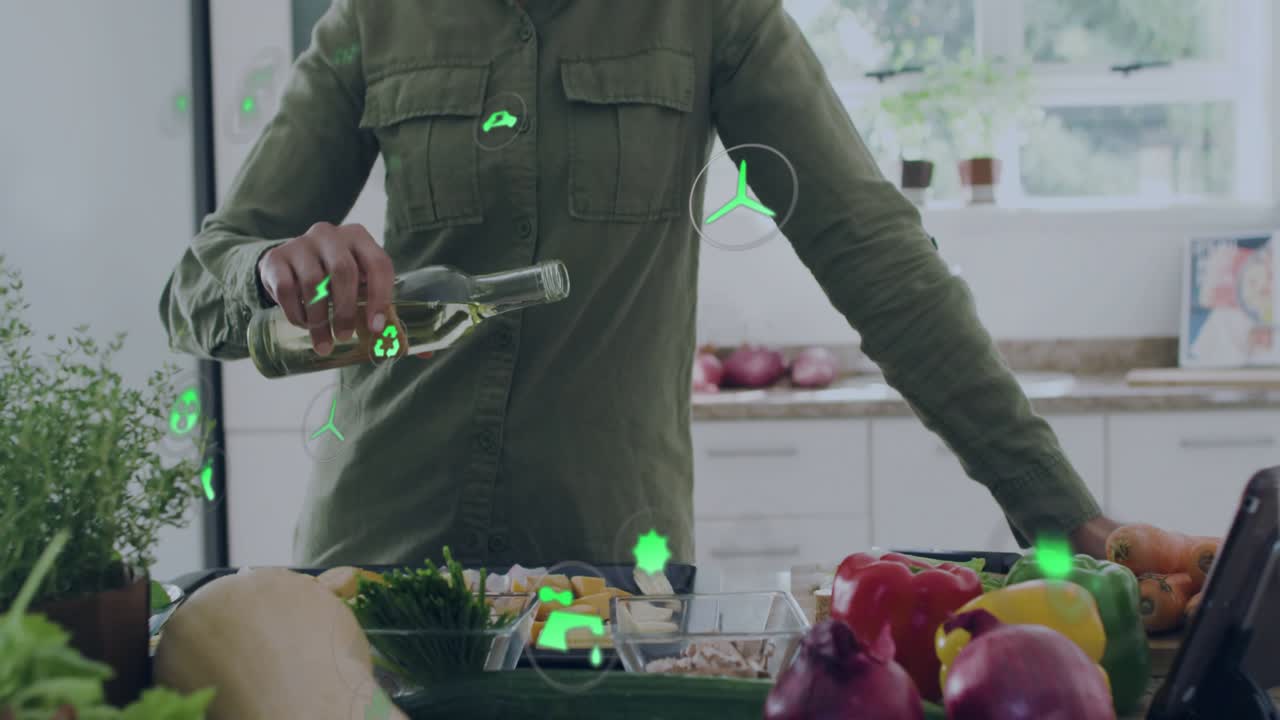Cook reaching for peppers, pouring oil over tray for eco meal while icons floating around her