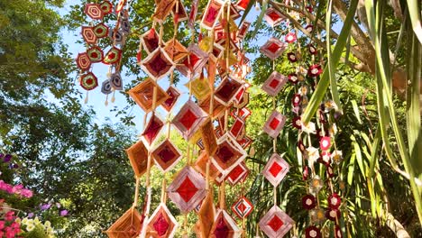 vibrant hanging decorations in a natural setting