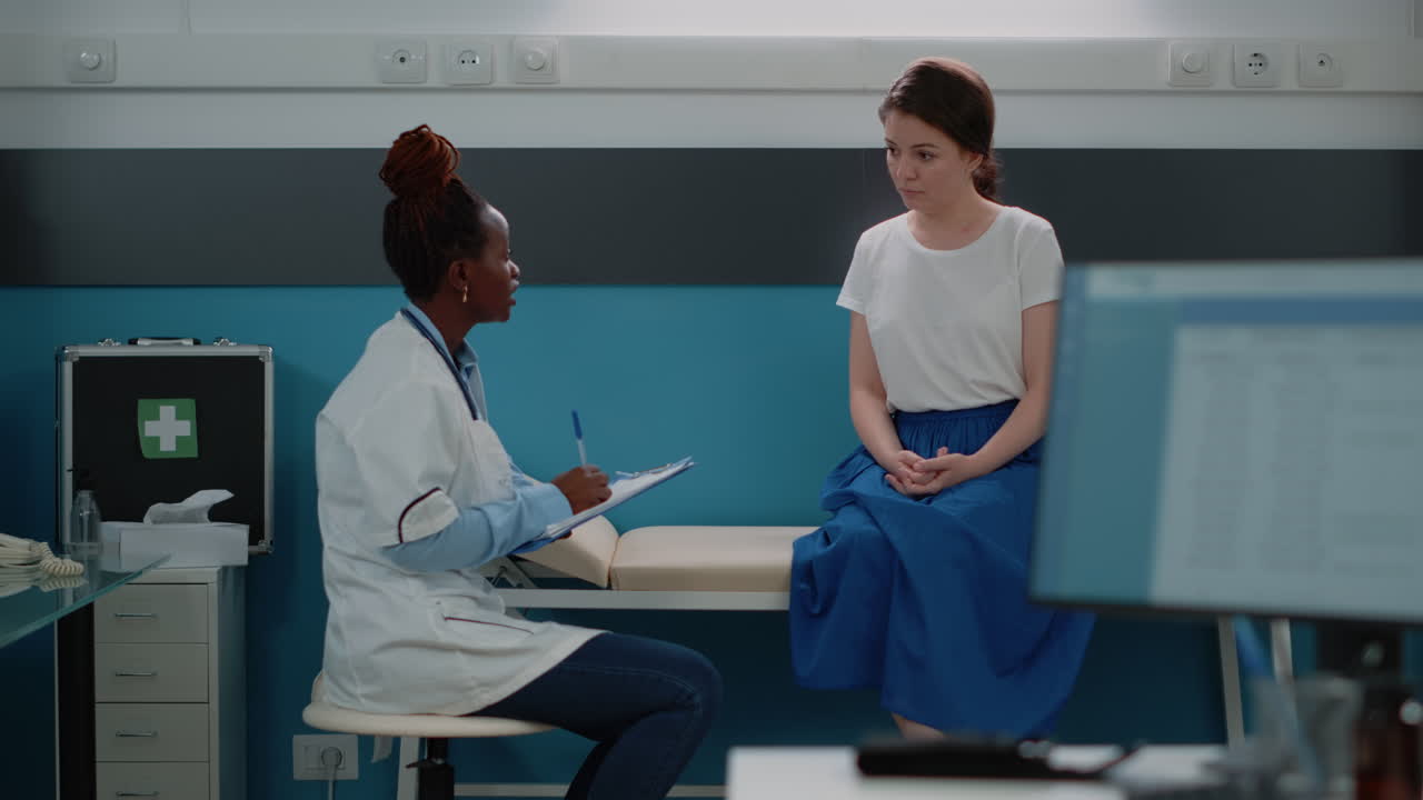Doctor consulting with patient in clinic