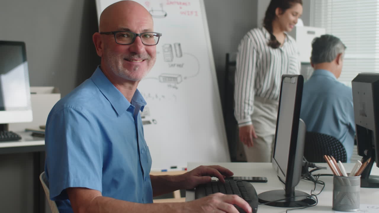 Portrait of Aged Man Attending Computer Class