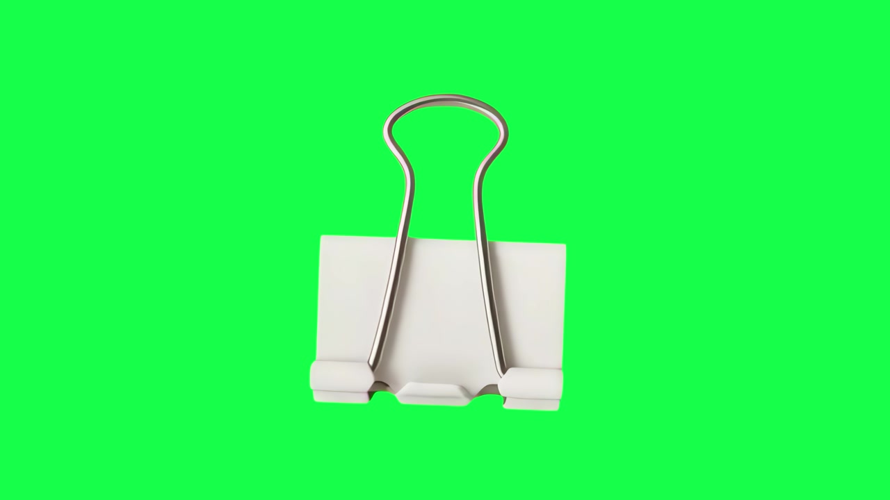 White Binder Clip Isolated on Green Screen