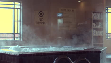 a short clip of a hottub running with steam rising