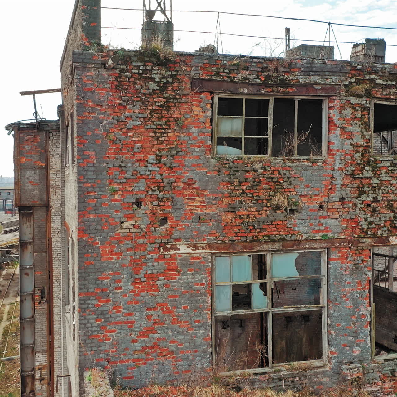 Abandoned ruined industrial factory building, ruins and demolition concept. Aerial view