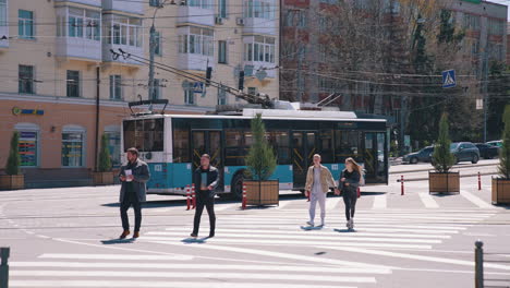 people crossing the street. view of young people crossing the street