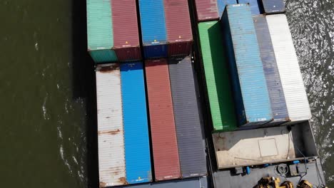 two barges attached to each other sailing on dutch waterway