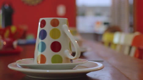 panning view on a living room table set up for breakfast real time