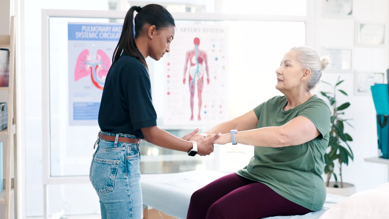 Physiotherapist, get up and helping senior woman