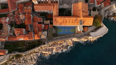 aerial view of dubrovnik old town with basketball court