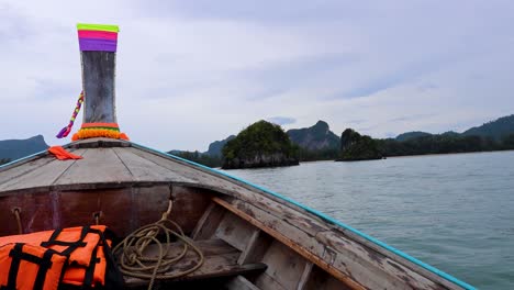 wooden boat journey through krabi's serene waters